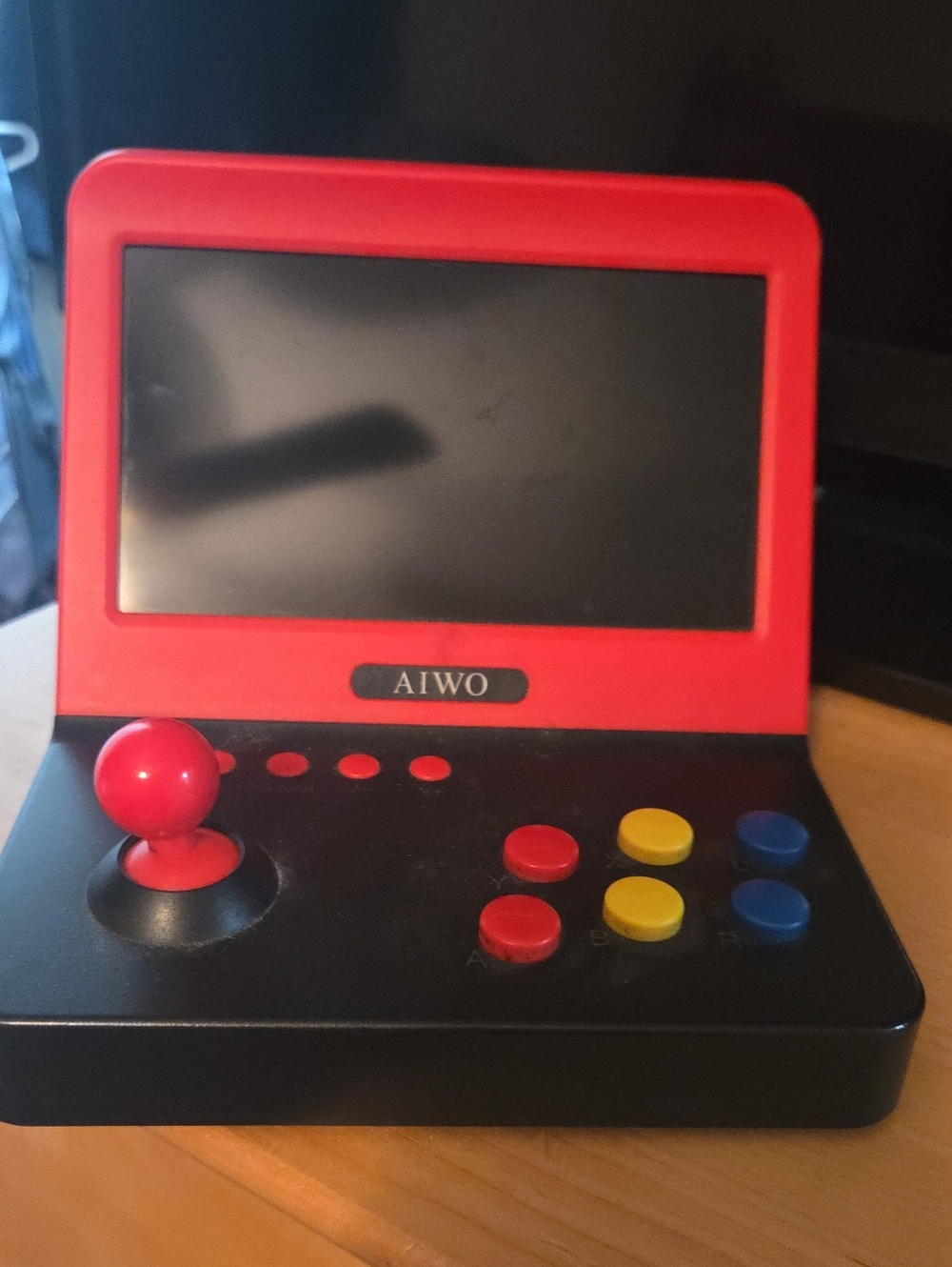 Portable Retro Handheld Game Console - Red & Black.  Has Many Many Games To Play
